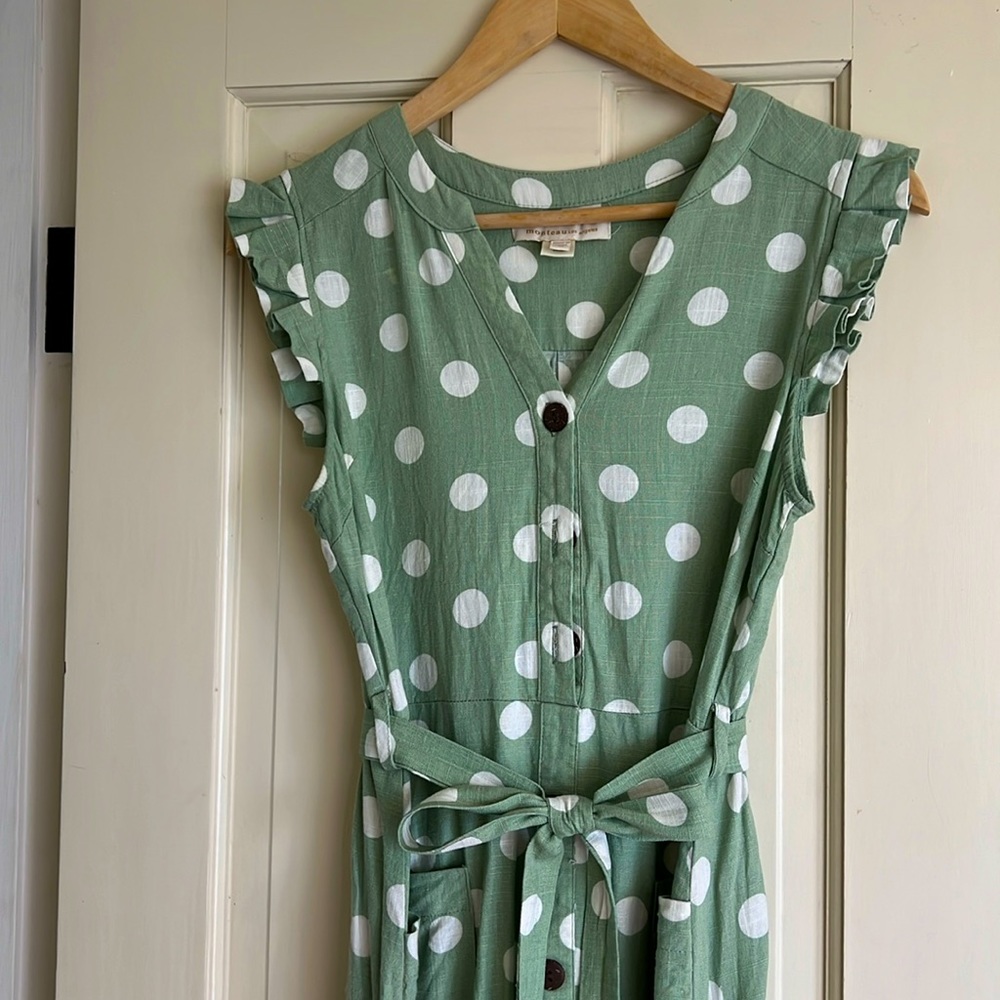 Belted, green linen dress. Midi length. Green with white polka dots.